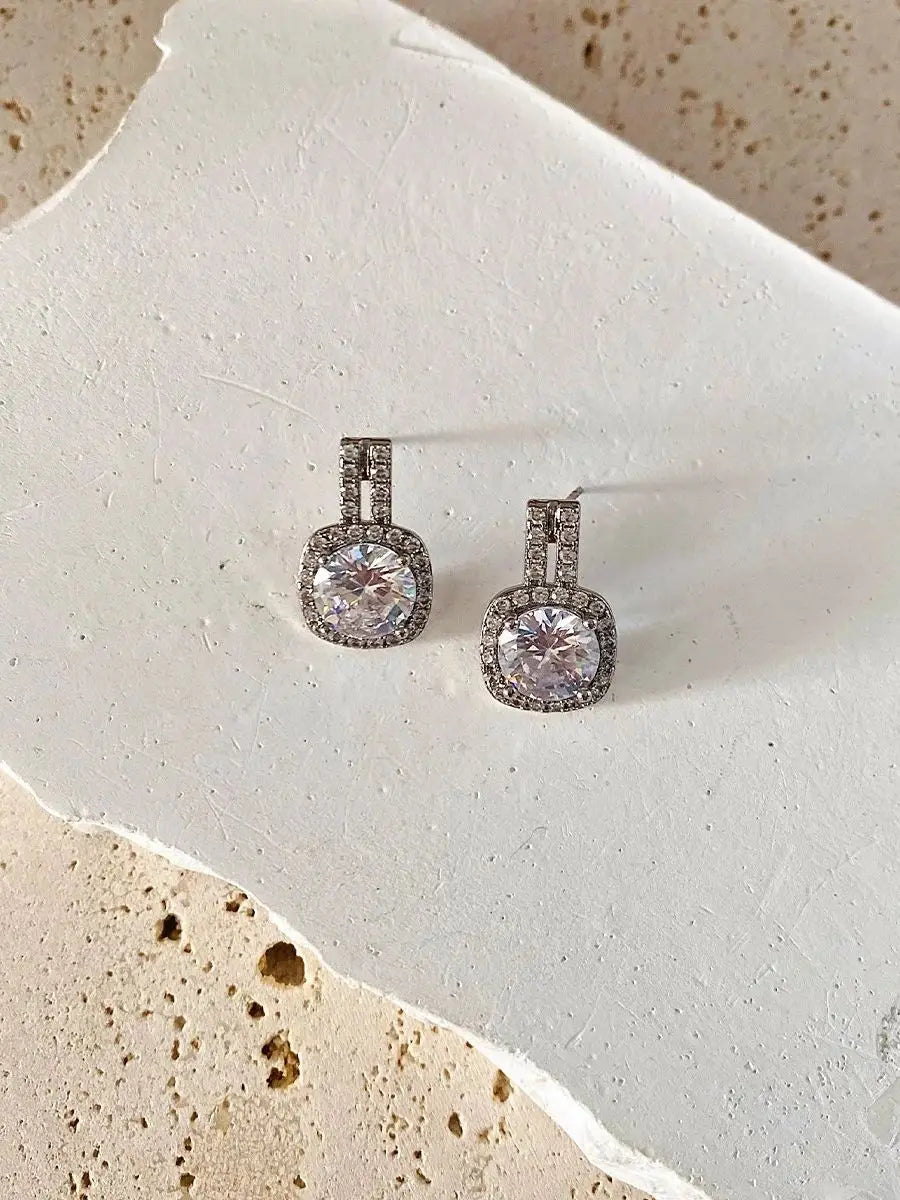Lxalry Rhodium Moissanite Halo Earrings – Hypoallergenic, 70-Point Prism Glow, Luxury Gift for Weddings & Daily Wear